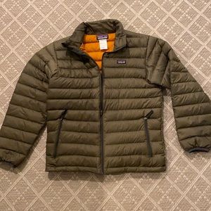 Puffer jacket. Army green with orange liner. Zipper pockets